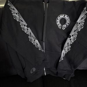 Elegant Black and White Zip Up Sweater with Ornate Patterns